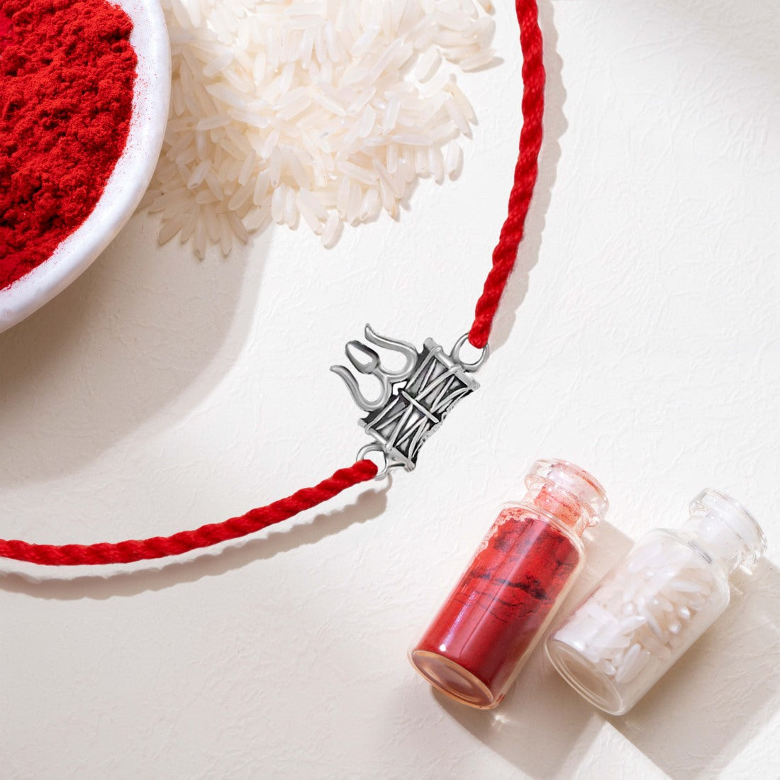 Divine Lord Shiva Trishul Rakhi With White Stones Rhodium Plated Sterl divine-lord-shiva-trishul-rakhi-with-white-stones-rhodium-plated-sterl