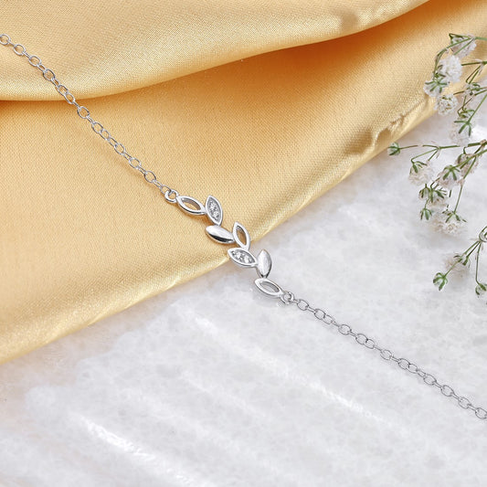 Women's 925 Sterling Silver leafy chain bracelet featuring cubic zirconia stones. – Zavya