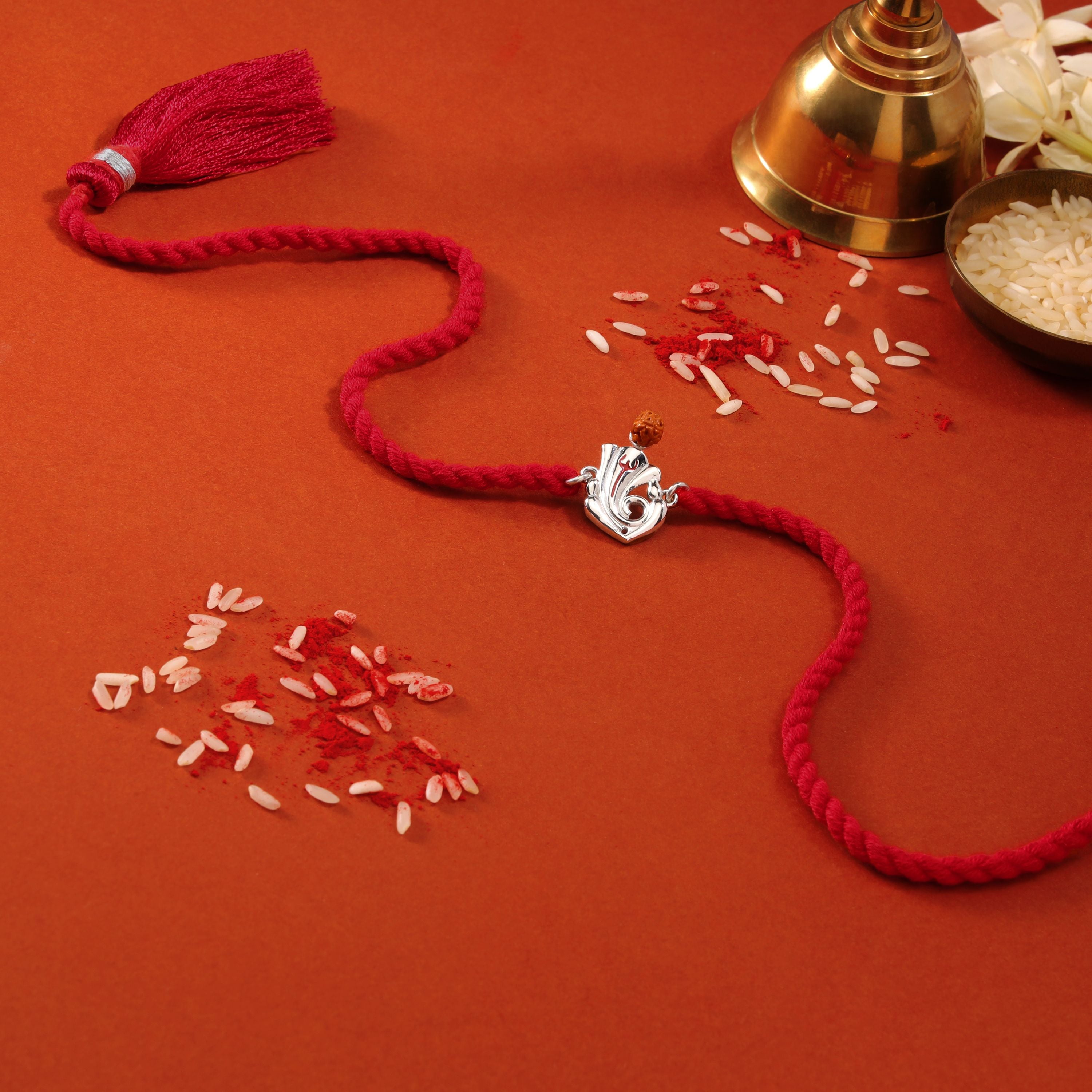 Sacred Ganesh Ji With Rudraksh Rhodium-Plated Sterling Silver Thread Rakhi