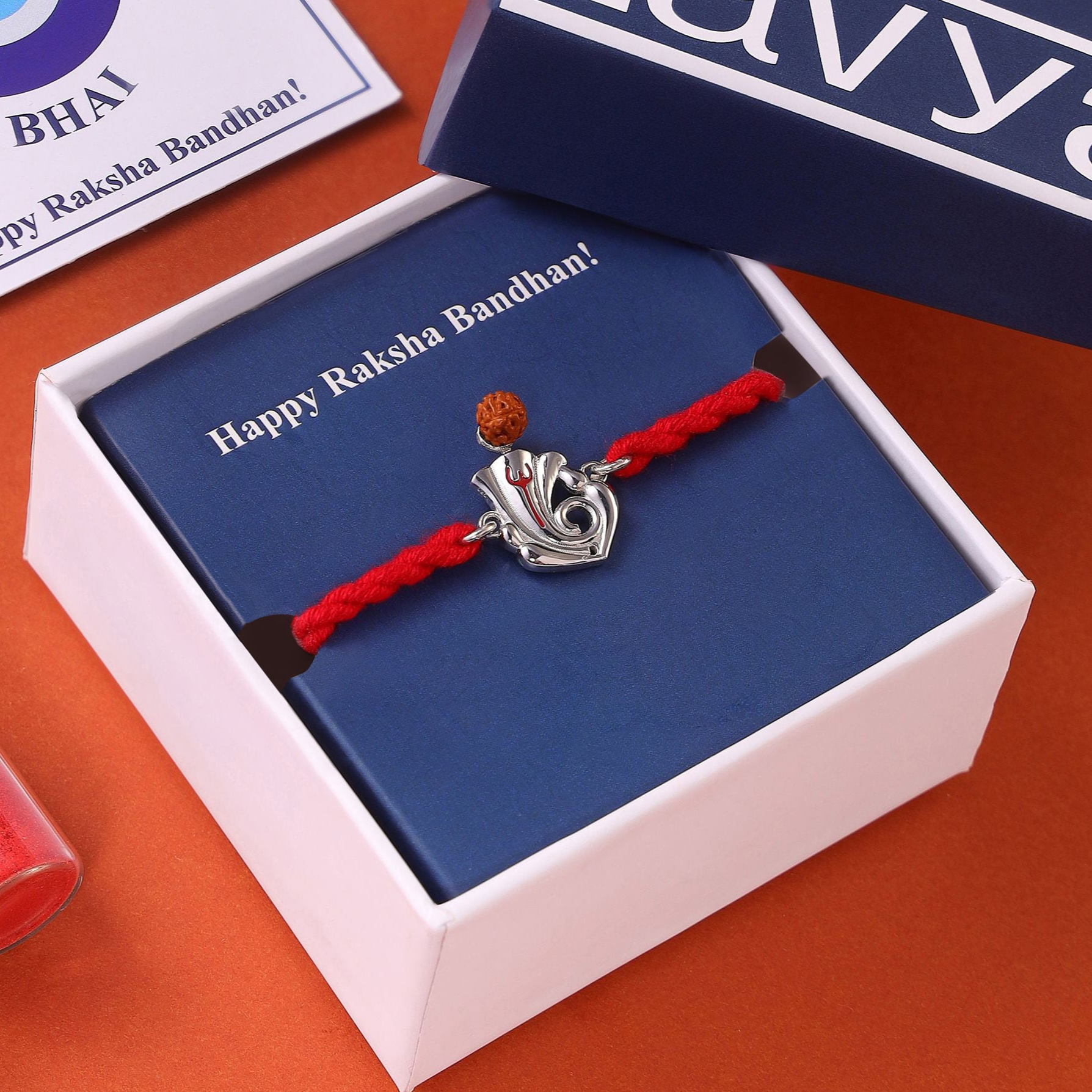 Sacred Ganesh Ji With Rudraksh Rhodium-Plated Sterling Silver Thread Rakhi