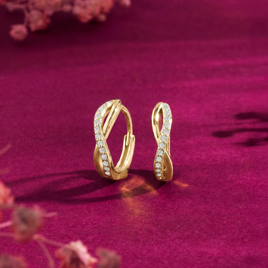 Gold hoop earrings with diamond accents